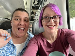 On the train to Hagstravaganza with fellow Beer Lady Katie