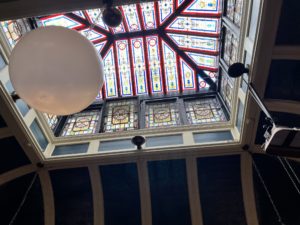 The stained glass inside The Palace Bar